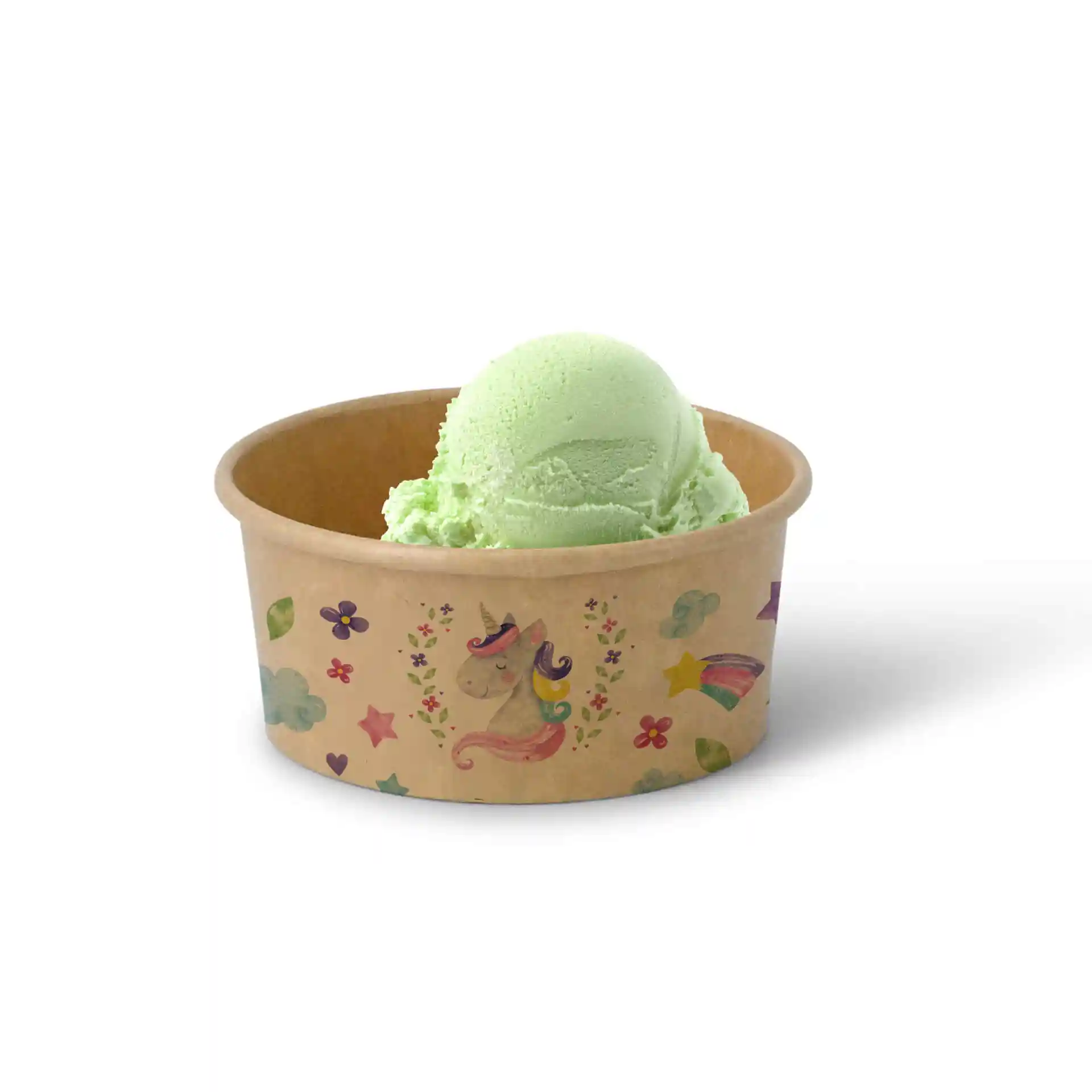 Gobelet rond en carton brun avec une boule de glace verte et des motifs colorés de licornes et d'étoiles.
