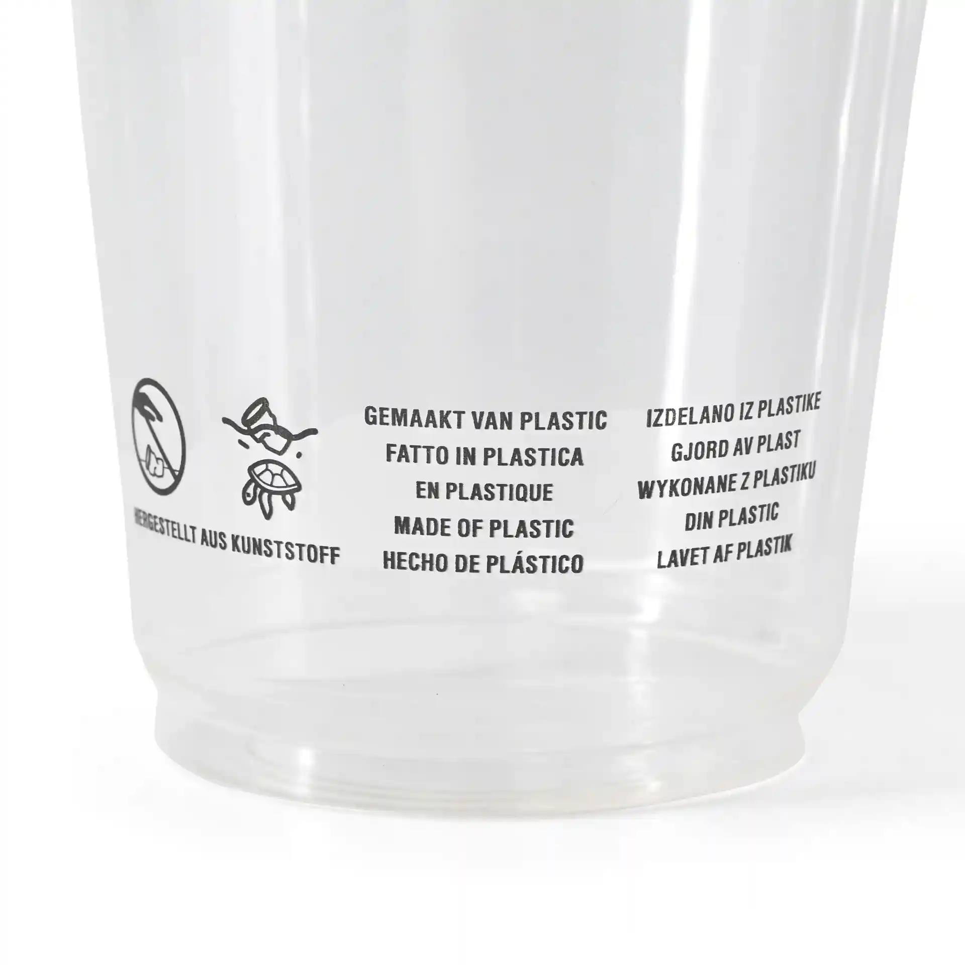 Klarer Plastikbecher mit gedruckten Etiketten zu Material und Gebrauchsanweisungen.