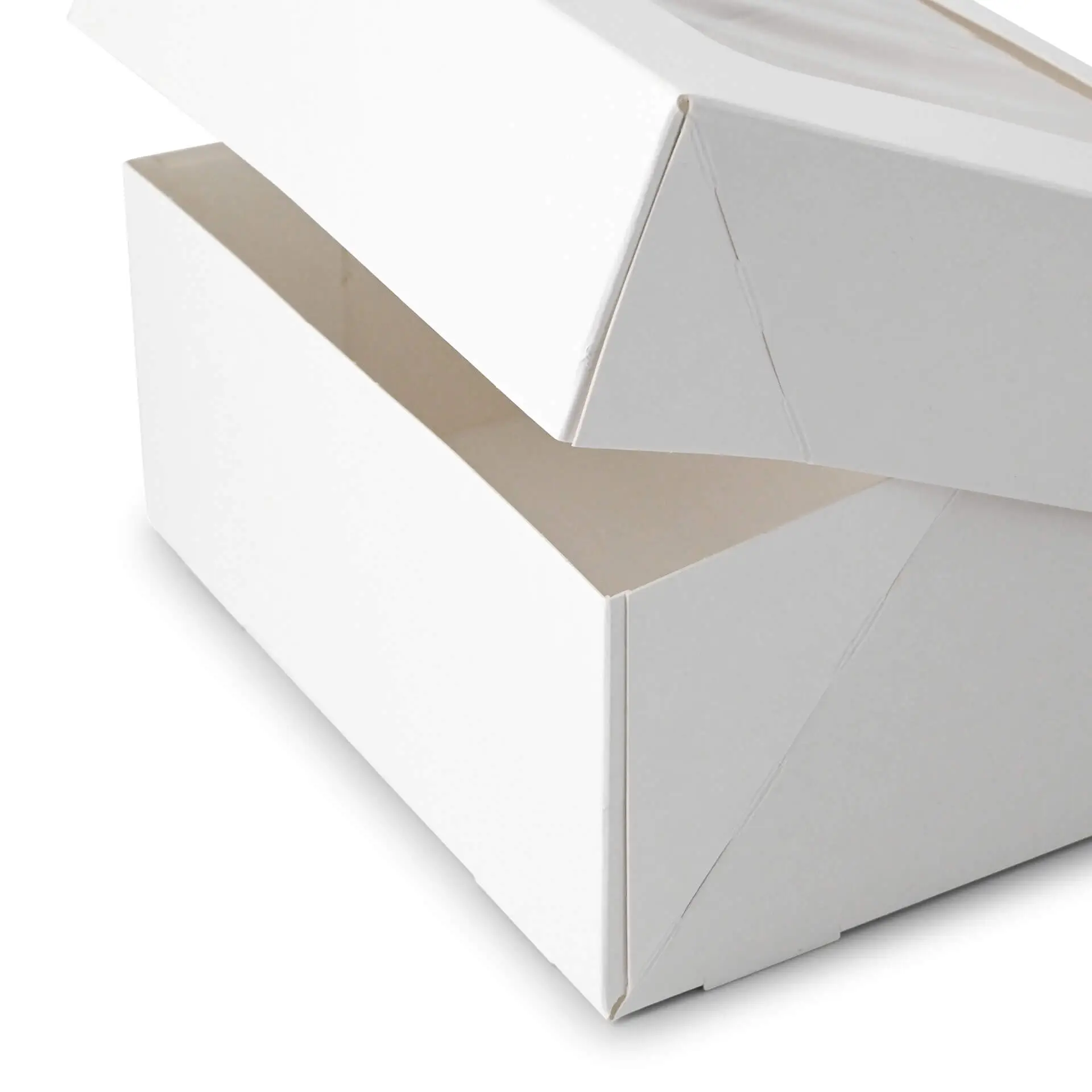 Boîte blanche pour cupcakes, avec une fenêtre en cellulose et un dessus ouvert, idéale pour l'emballage de produits alimentaires.