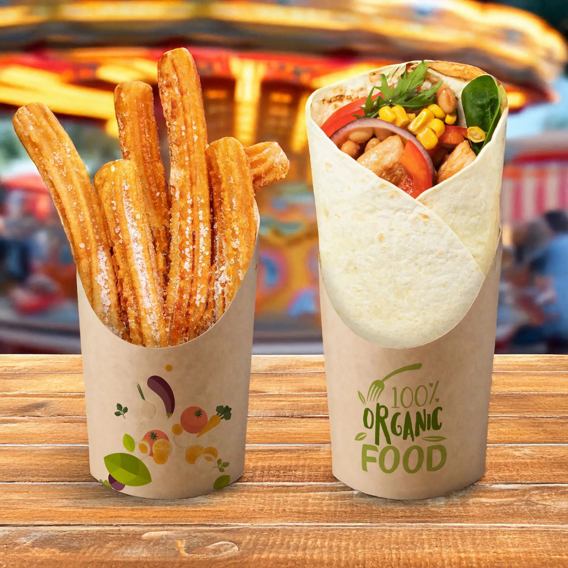 Churros dans un gobelet en carton kraft et un wrap rempli de divers ingrédients dans un gobelet similaire, sur une table en bois.