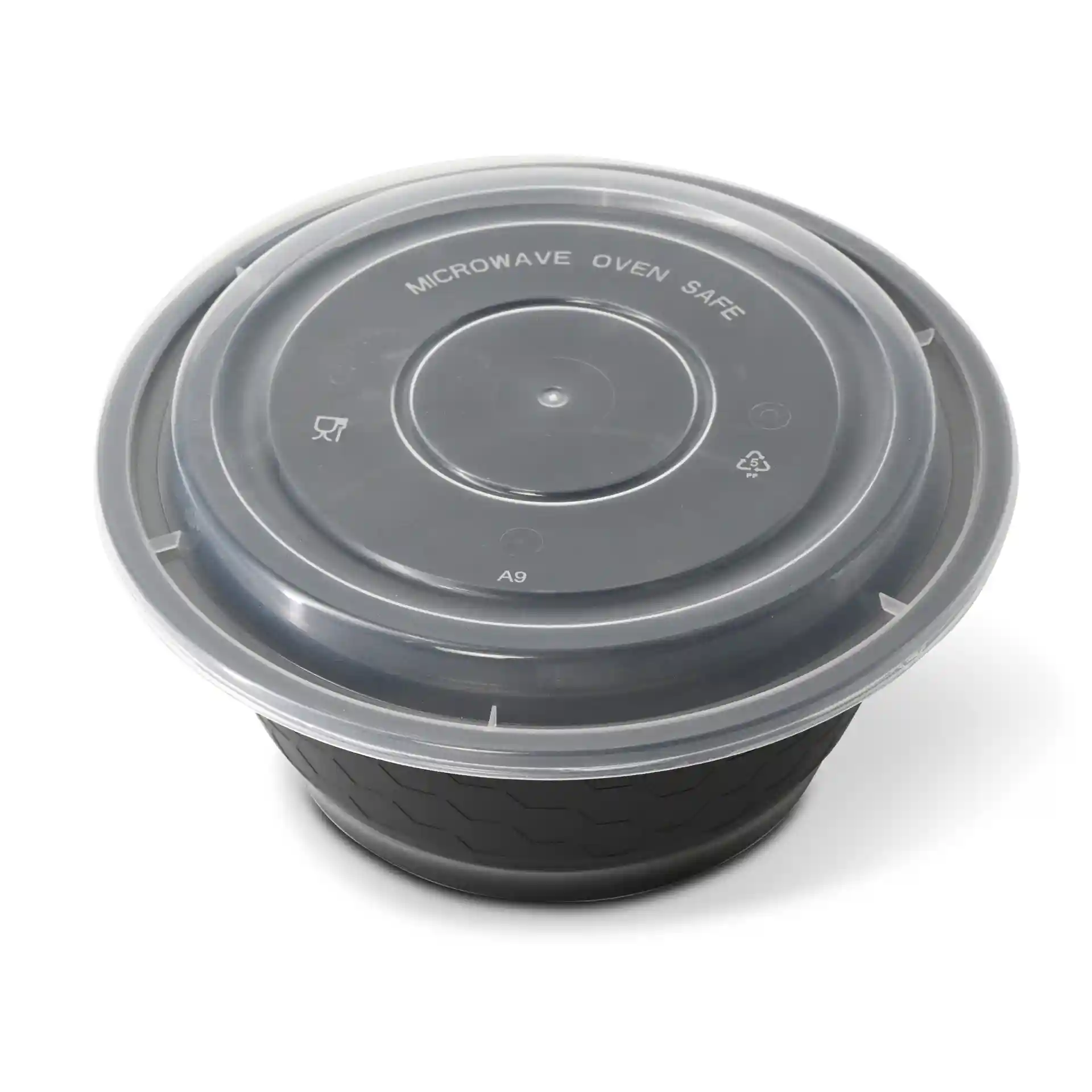 Contenitore nero rotondo con coperchio trasparente, superficie testurizzata e diametro di 183 mm.