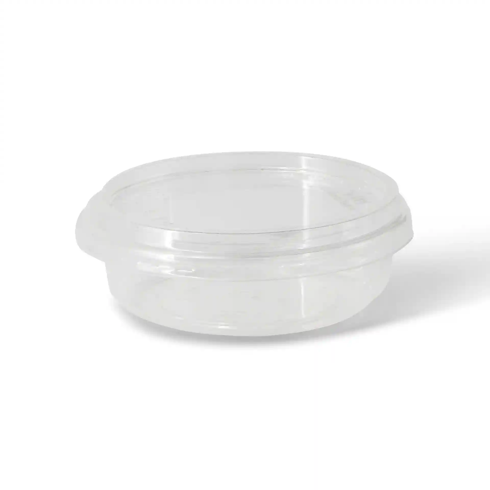 Contenitore rotondo trasparente con un diametro di 120 mm e un'altezza di 34 mm.