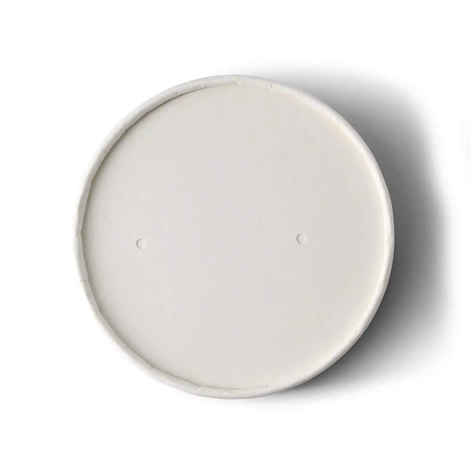 Couvercle en carton blanc d'un diamètre de 100 mm avec deux petits trous sur la surface.