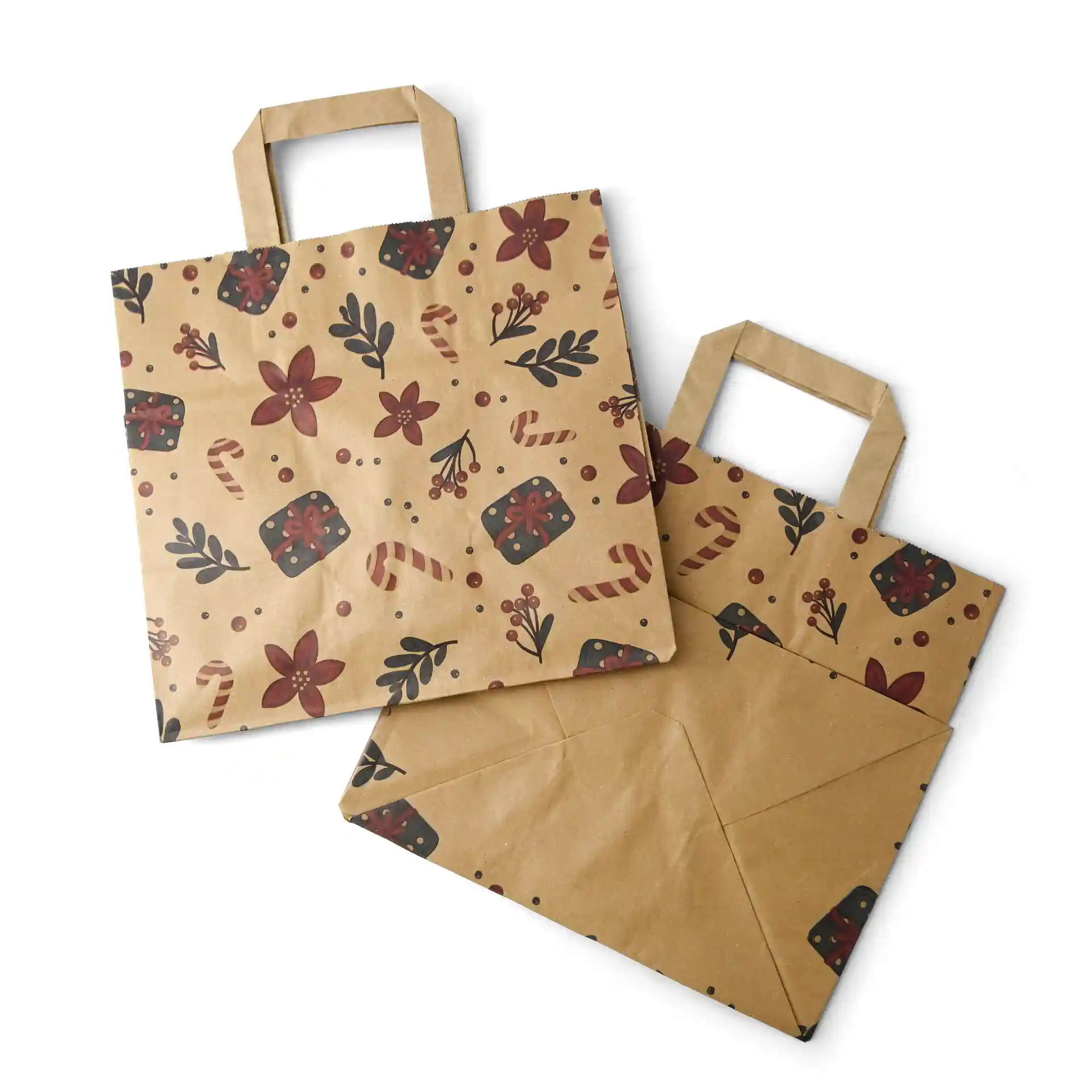 Busta di carta marrone con design invernale, con motivi floreali e bastoncini di zucchero, con due manici.